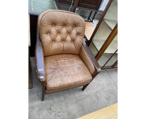 A MID 20TH CENTURY BUTTON-BACK FIRESIDE CHAIR 