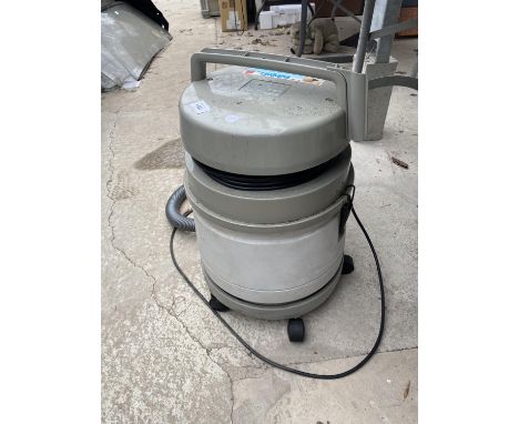 A COMPACT WET AND DRY VACUUM  BELIEVED IN WORKING ORDER BUT NO WARRANTY 