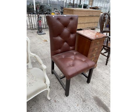 A MODERN LEATHER BUTTON BACK AND SEATED ARMLESS CHAIR 