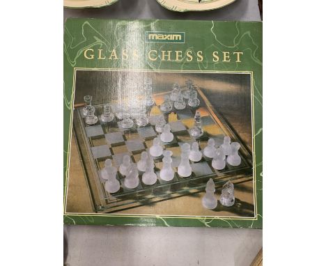 A GLASS CHESS SET BOXED 