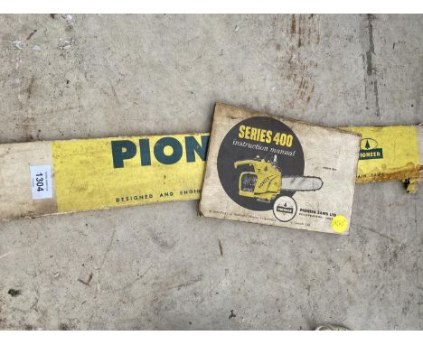 A PIONEER CHAINSAW GUIDE BAR WITH A PIONEER 400 CHAINSAW MANUAL 