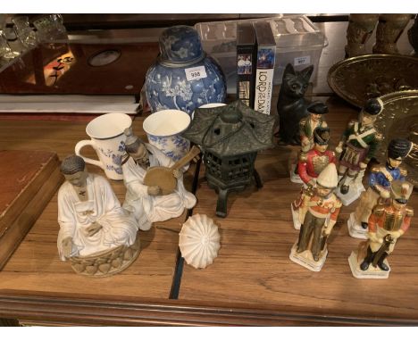 AN ASSORTMENT OF VARIOUS ITEMS TO INCLUDE TWO MUD MEN, A SMALL CAST PAGODA, A GINGER JAR, SIX CERAMIC MODEL SOLDIERS ETC 