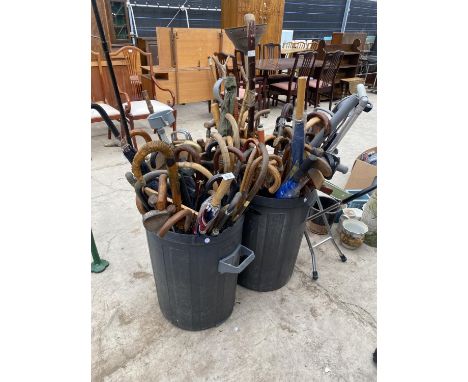 AN EXTREMELY LARGE QUANTITY OF WALKING STICKS, STICK SEATS AND GOLF CLUBS ETC 