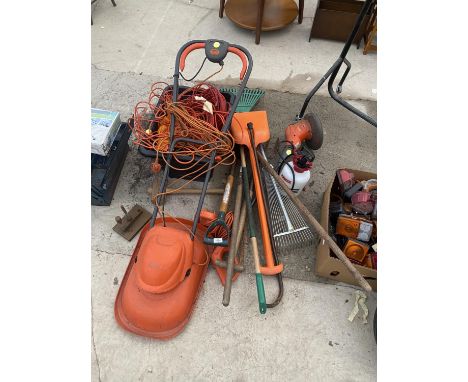 AN ASSORTMENT OF GARDEN TOOLS TO INCLUDE A STRIMMER, SHOVELS, A FLYMO LAWN MOWER, HARDWARE ITEMS TO INCLUDE A MALLET AND AN E
