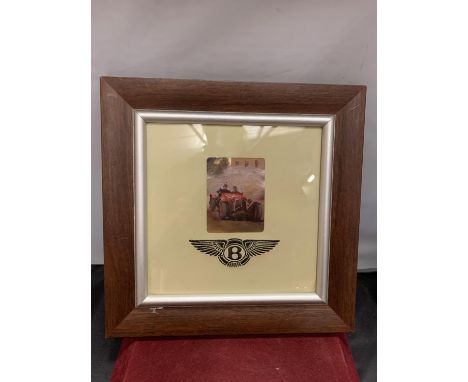 A FRAMED 'BENTLEY' PICTURE AND BADGE 