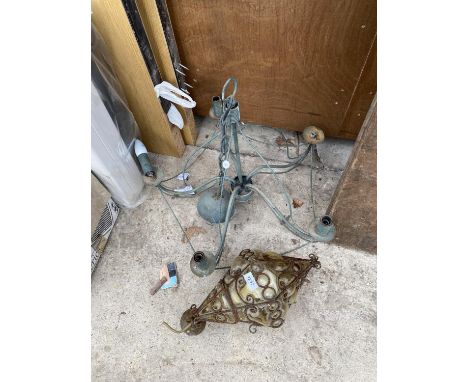 A DECORATIVE LIGHT FITTING AND A FURTHER LIGHT FITTING 