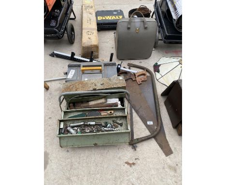 AN ASSORTMENT OF VINTAGE HAND TOOLS TO INCLUDE A BOW SAW, TWO WOOD SAWS AND A TOOL BOX ETC 