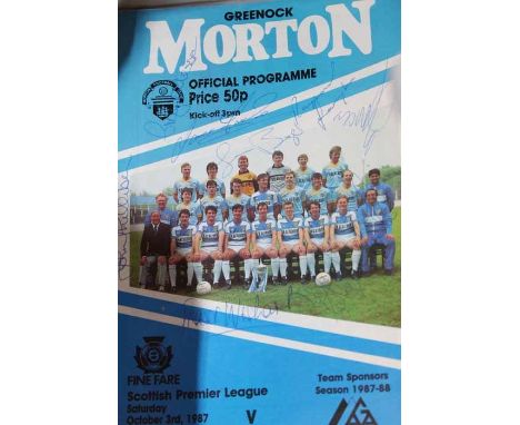 GOOD LOT OF FOOTBALL PROGRAMMES AND FOOTBALL GUIDES
including a signed Greenock Morton FC programme from 1987 together with o