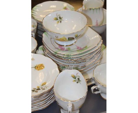 PAIR OF FLORAL TEA SETS
including Royal Standard 'Sunset' set, and one other