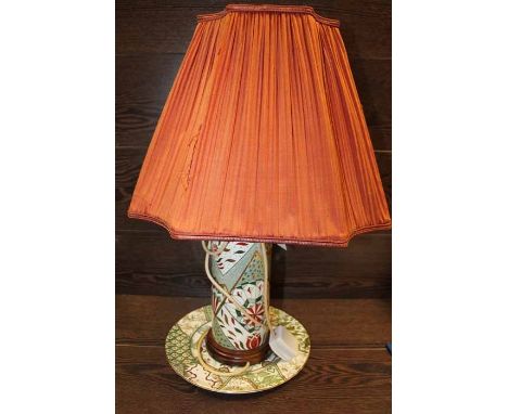 MASON'S APPLIQUE TABLE LAMP AND PLATE
both in green and orange tones, the lamp with orange shade, 53cm high overall