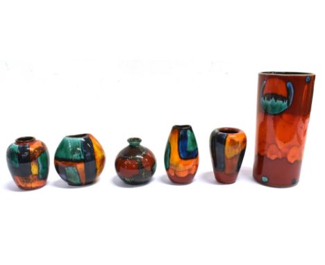 A GROUP OF SIX POOLE POTTERY VASES The Volcano pattern pillar vase is stamped 'Poole England' to the base with the initials, 