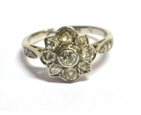 PLATINUM &amp; ESTATE DIAMOND CLUSTER Grain set floral cluster with old cut diamonds, est TDW 1.25 carats, with quality asses