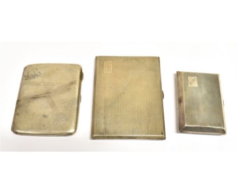 THREE STERLING SILVER CIGARETTE CASES Two decorated with fine engine turning and one plain with monogram, variously hallmarke