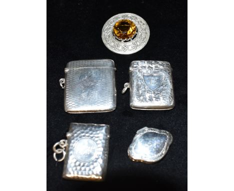 ASSORTED VESTA CASES &amp; CELTIC BROOCH Three finely engraved and chased vesta cases, with pendant bale fittings, variously 