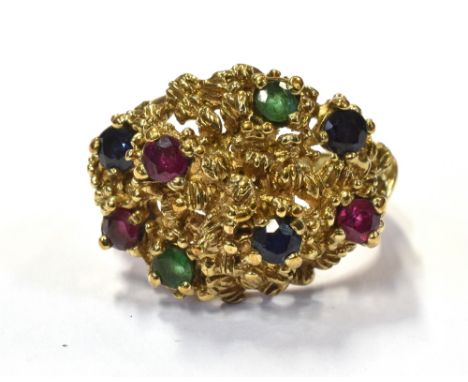 MULTI GEM SET 9CT GOLD RING Textured bombe style head set with 3.0mm round mixed cut sapphires, rubies and emeralds.  Ring si