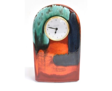 A POOLE POTTERY GEMSTONE PATTERN MANTLE CLOCK With a maker's label to base 'hand painted in Poole Dorset'. It is also stamped