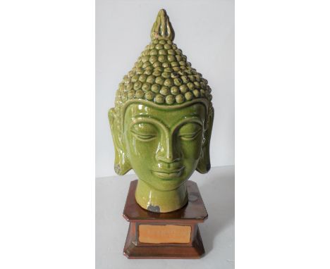 Fine quality, early 20thC green crackle glazed head of Hindu Goddess sat on a separate ceramic plinth,37 cm tall 