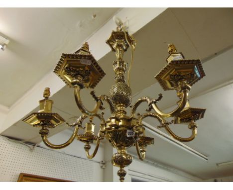 A brass six branch chandelier