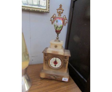 A French alabaster clock surmounted Sevres finial, a/f