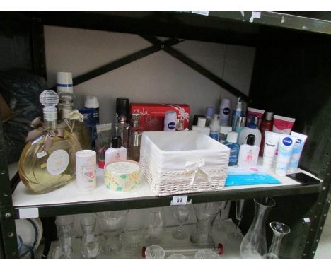 A shelf of toiletries etc