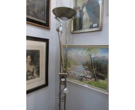 A modern uplighter floor lamp