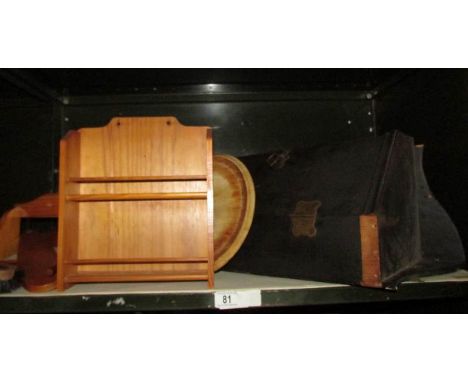 A shelf of wooden items including small corner cupboard