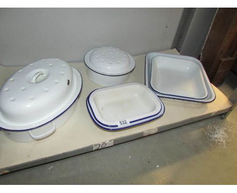 A shelf of enamel oven ware