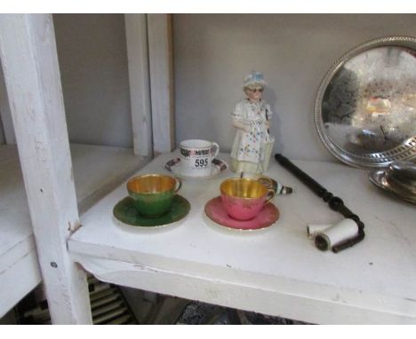2 Demi Tasse cups and saucers, a 19th century nodding figure, old pipe etc