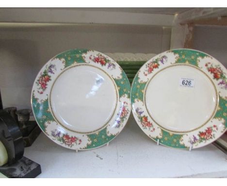 An asparagus dish and 4 plates