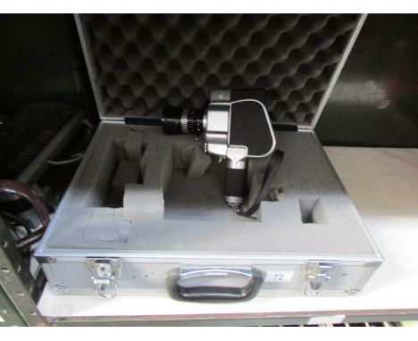 A vintage movie camera in case