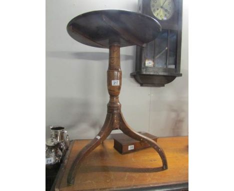 An oak tripod table