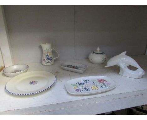7 items of Poole pottery