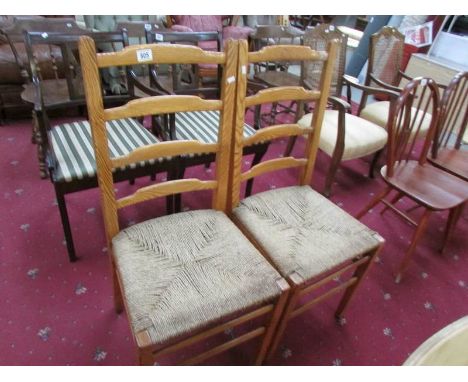 A pair of ladder back chairs