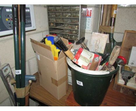 2 sets of tool drawers together with a box and a bucket of tools
