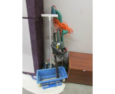 A quantity of garden tools including strimmer