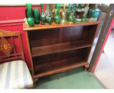 A Georgian style crossbanded figured walnut and oak book shelf with height adjustable shelf over cabriole feet, 96cm wide x 8