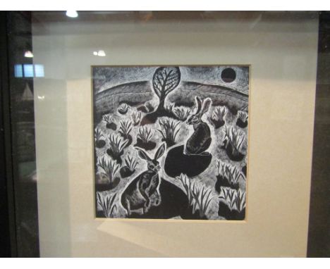 A modern monotone print depicting hares in field, black frame, 11cm x 11cm