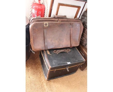 A large pig skin Gladstone back together with a square trunk