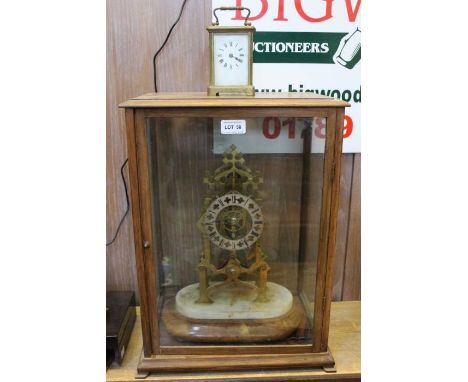 A skeleton clock in case & brass carriage clock58A skeleton clock in case & brass carriage clockCondition: generally good, ch