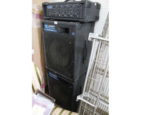 A Laney P.A. system having four channel amplifier, model Theatre 100T and a pair of Theatre 1300 speakers 
