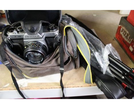 Pentax K1000 together with lenses &amp; camera stand