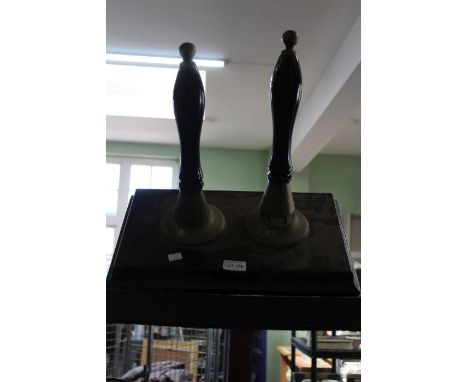 Two manual beer pump handles