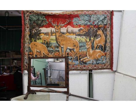 A mahogany framed dressing table top mirror, together with a Belgium tapestry depicting deer