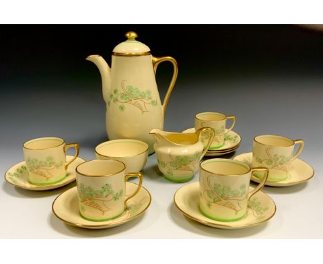 A Grays Pottery Basket of Flowers Sunbuff pattern coffee set. for five inc coffee pot, cream jug , sugar bowl, five coffee ca
