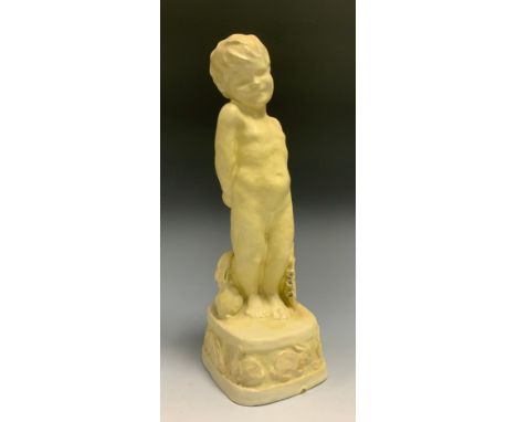 A mid 20th century Poole figure, glazed in cream, of a cherub, standing, naked, a rabbit at his side, the rounded square base