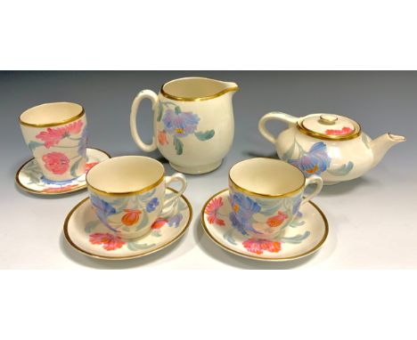 A Grays pottery hand painted duet set, painted with blue and pink flowers, comprising, teapot, large milk jug, beaker, pair o