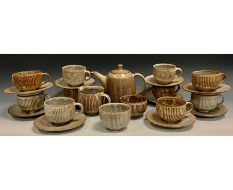 David Leach (1911 - 2005), A fluted stoneware tea service for five, comprised of teapot, milk jug, sugar bowl, and five teacu