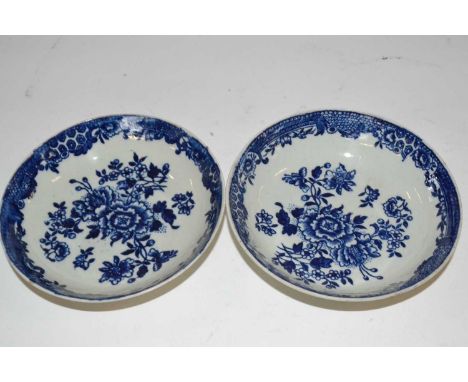 A pair of Liverpool porcelain saucers, circa 1780 with blue printed floral design