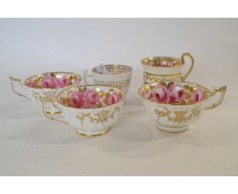 Group of five English porcelain cups, mid 19th Century, four with paintee rose design, probably Coalport