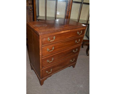 Small mahogany chest in Georgian style fitted with four graduated drawers with brass swan neck handles raised on bracket feet